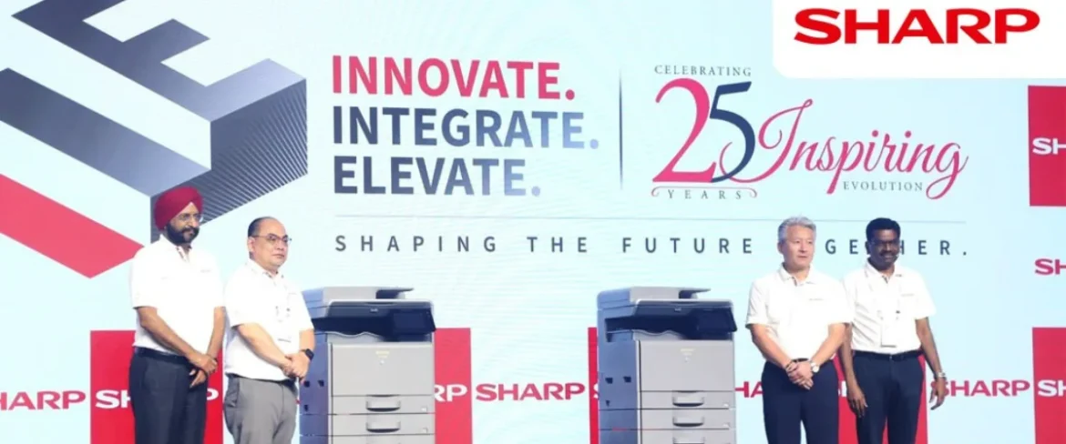 SHARP BP-22C series A3 colour multifunction printer on display at SHARP National Dealer Meet 2025 in India, highlighting compact design and touchscreen panel.